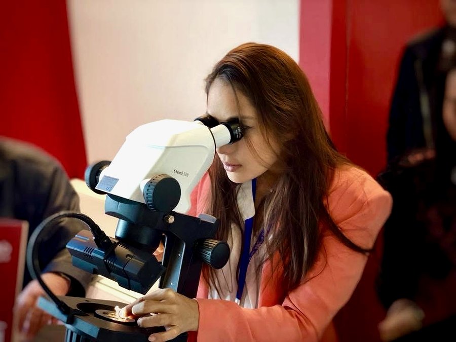Nadia examining gemstones